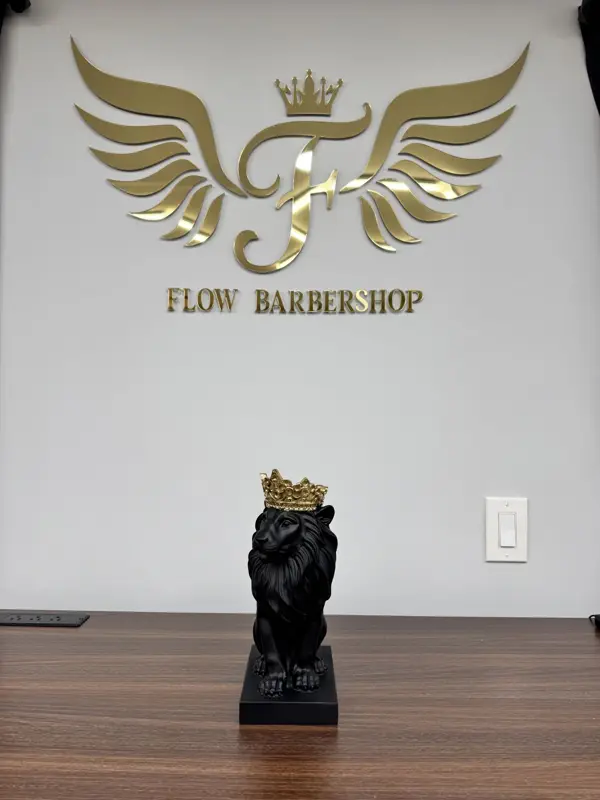 Gold Flow logo above the crowned lion